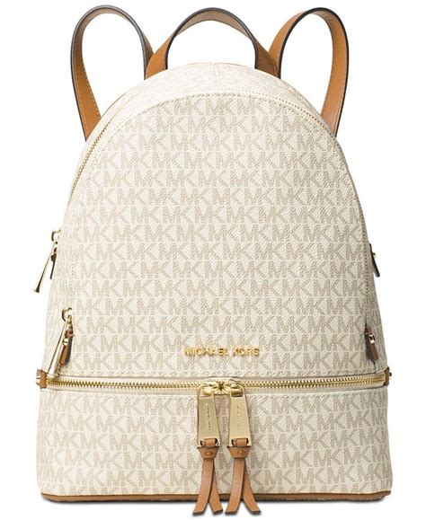 From tote bags and satchels to hobo bags and shoulder bags, michael kors is constantly on the forefront of innovating handbag fashion. Michael Kors Signature Rhea Zip Medium Backpack & Reviews ...