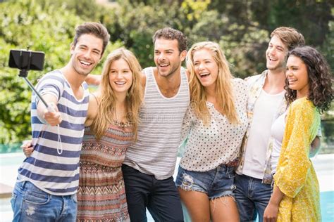 Group Of Friends Taking A Selfie Near Pool Stock Image Image Of Foreground Focus 68236207