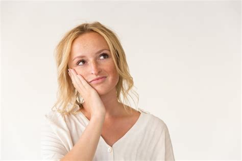 Free Photo Pensive Woman With Hand On Cheek