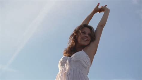 Happy Beautiful Woman Stretching Towards The Sky Slow Motion Shot At