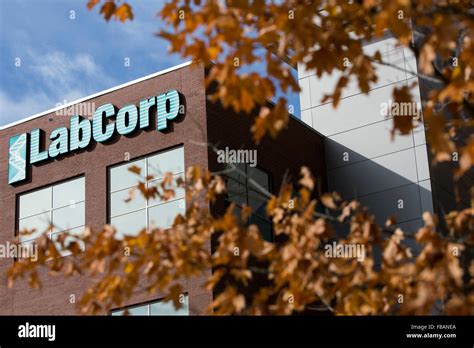 A Logo Sign Outside Of The Headquarters Of Laboratory Corporation Of