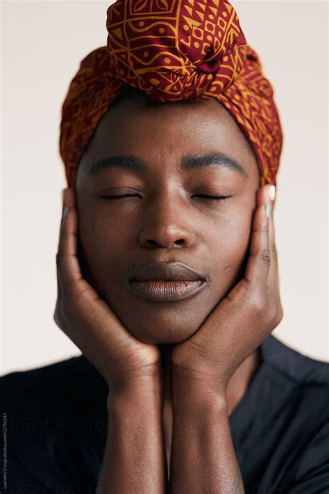 African American Woman Portrait With Eyes Closed By Stocksy