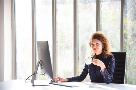 Attractive Beautiful And Confident Business Woman Working With Computer