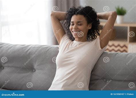 Smiling Black Woman Relax On Couch At Home Stock Image Image Of