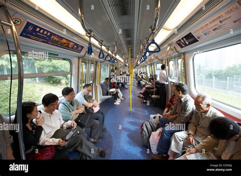 Passengers Inside Train In Motion On Mtr Overground Line Former Kcr