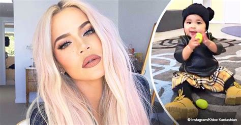 khloé kardashian melts hearts with video of true in checked burberry skirt and beanie with pom poms