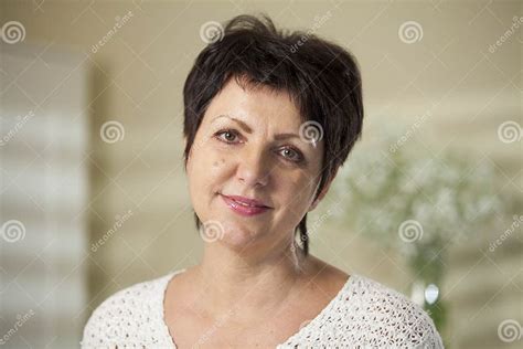 mature woman smiling stock image image of home kind 49335927