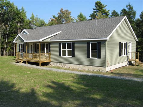 Modular Ranch Exterior With Green Siding And Black Shutters Excel