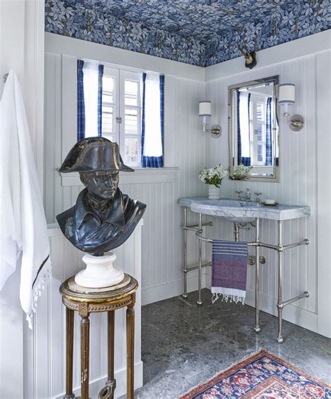 This bathroom is cleverly designed the way the blue and white tiling from the main area of the bathroom. 13 Blue Bathrooms Ideas - Blue Bathroom Decor