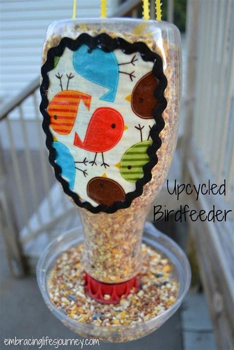The kids will love making these bird seed ornament feeders and enjoy watching the birds for hours as they flock to them! DIY Bird Feeder Ideas - DIYCraftsGuru