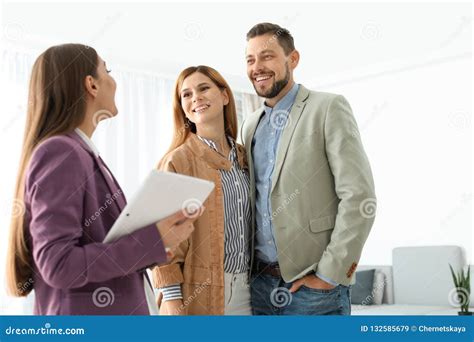 Female Real Estate Agent Working With Couple Stock Image Image Of Agent Mortgage 132585679