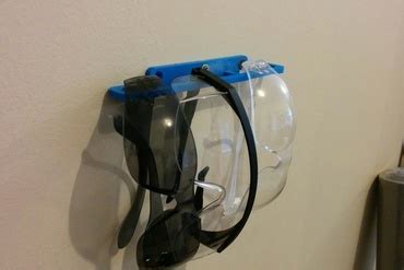 Includes a foam insert to cushion glasses. YouMagine - Safety glasses holder - wall-mount by excite - YouMagine 🏠