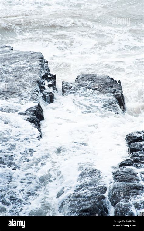 Rocky Shore In Stormy Weather Seas Waves Stock Photo Alamy