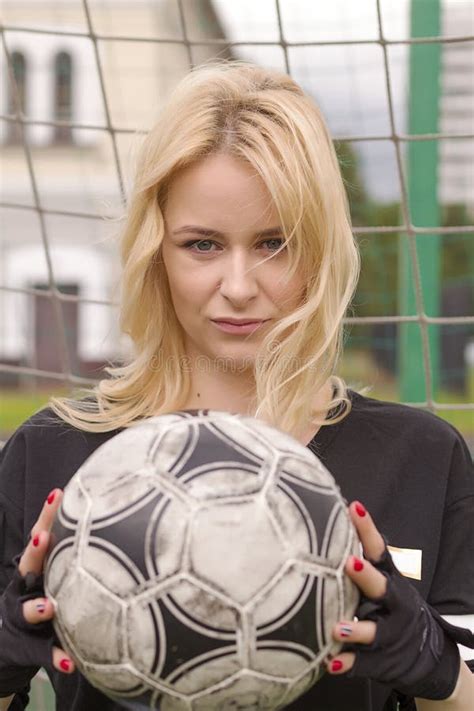 Beautiful Blonde With A Ball At The Football Goal Stock Photo Image Of Athlete Green