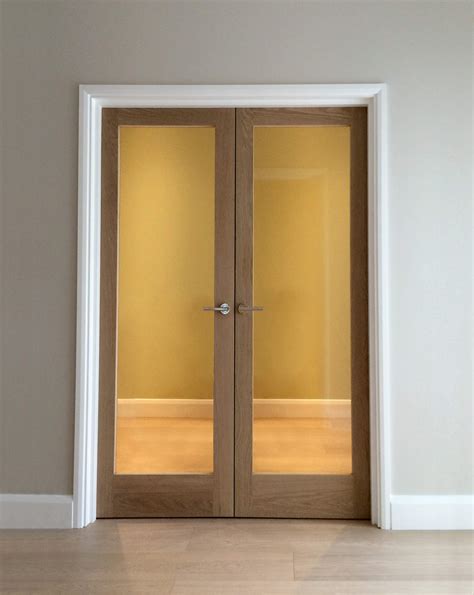 Interior doors can make a striking statement. Internal Glazed Double Doors - London Door Company