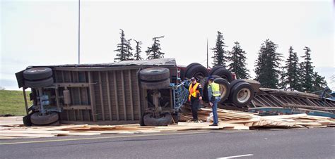 A bicycle/pedestrian path is available in the bridge median. Lumber truck rolls near I-205 bridge | The Columbian