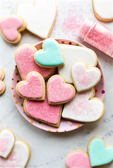 Cut into shapes, dipping the cutter into flour as you go, and place the cookies a little apart on 2 parchment or silpat lined baking sheets. The Best Sugar Cookies (Recipe & Video) | Sally's Baking ...