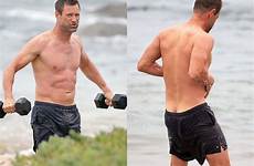 eckhart shirtless accidentally flashes measurements