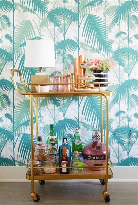 Add A Tropical Vibe To Your Home With This Palm Wallpaper Design Hotel