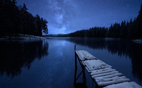 Dock On The Lake On Starry Winter Night