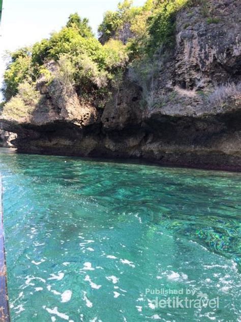 5) air dicencang tidak akan putus. Pantai dengan Air Laut Bagai Cermin di Gorontalo