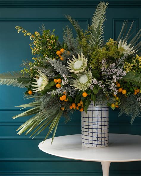 7 Unusual Winter Flower Arrangements—and Vases—that Are Perfect For The