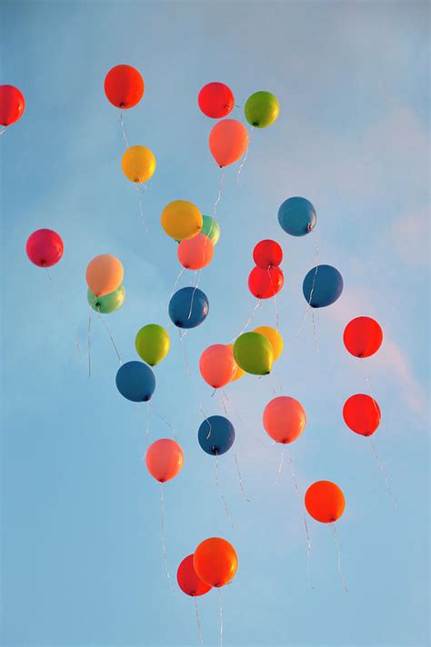 Bunch Of Balloons Floating In Sky By Henglein And Steets