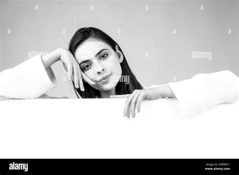 Beauty Portrait Of Beautiful Female Model With Facial Mask Cream Isolated Banner With Copy