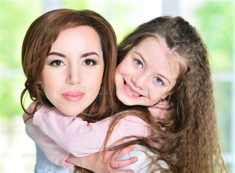 Little Girl Hugging To Mother Stock Photo Image Of Small People