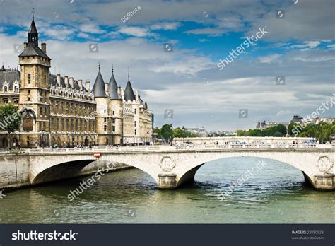 Seine river will not leave its visitor's disappointed. View Of Palais De Justice And A Bridge Over The Seine ...
