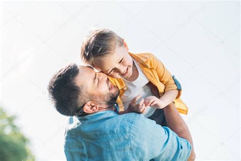 Happy Father Hugging Adorable Smiling Little Son Park Stock Photo