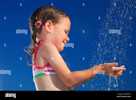 Girl Having Shower Outdoors Switzerland Stock Photo Alamy