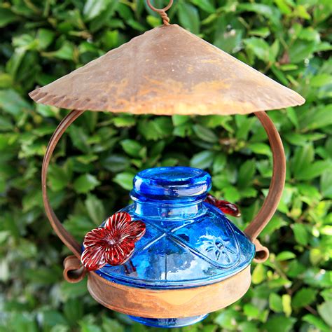 Cypress vine terrace garden hummingbird vines pots container gardening blog plants. Pot de Creme Glass Hummingbird Feeder with Shelter - Yard Envy
