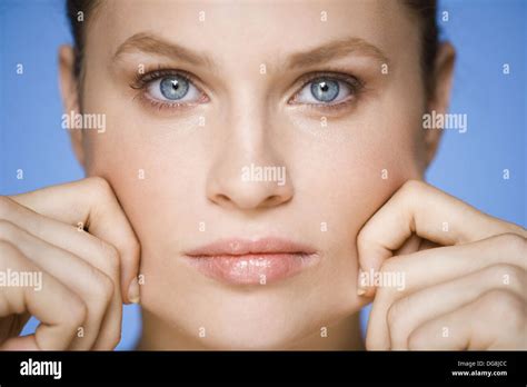 Pinch Cheek Hi Res Stock Photography And Images Alamy