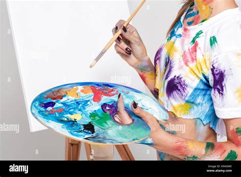 Female Artist Holding Palette With Paints For Drawing Stock Photo Alamy