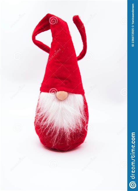 Red Christmas Gnome With White Beard In Red Clothes And Cute Hat
