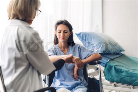 Female Doctor Discussing And Consulting Stock Image Colourbox