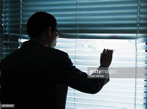 Looking Through Blinds Photos And Premium High Res Pictures Getty Images