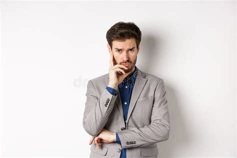 Troubled Frowning Business Man In Suit Looking At Camera Pensive