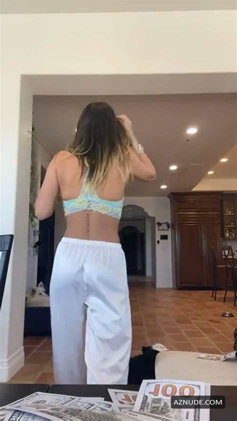 Bella Thorne Flashes Her Sexy Fake Boobs Wearing A Tiny Blue Yellow Bra