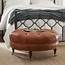Button Tufted Round Leather Wheeled Ottoman With Spindled Wooden Legs 