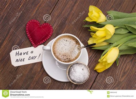 Cup Of Coffee Tulips Have A Nice Day Massage And A Heart Stock Photo