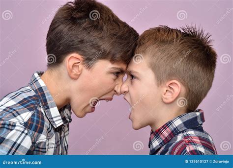 Two Angry Brothers Quarreling Stock Image Image Of Fighting Looking