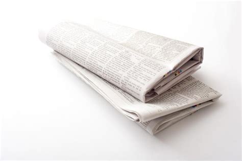 The theme is developed by team tagdiv. Free image of Close up of two folded printed newspapers