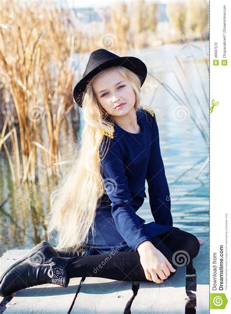 I've fixed the script so it won't happen again for future videos. Cute Fashion Little Girl Is Resting Near Lake Stock Photo ...