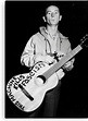 Woody Guthrie and his guitar: "this machine kills fascists" - early ...