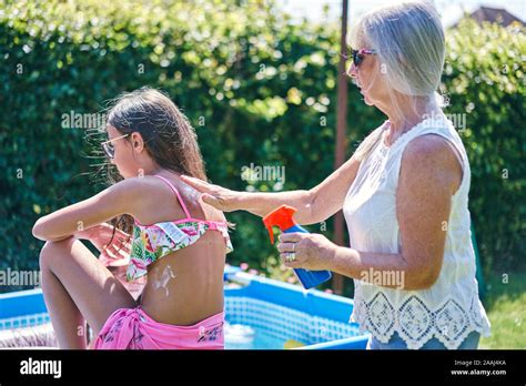 Putting On The Sun Lotion Hi Res Stock Photography And Images Alamy