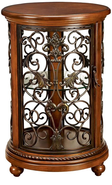 Best curio cabinets on the market today. Florentine Round Wood And Iron Curio Cabinet | LampsPlus ...