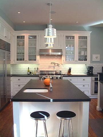 If don't like your current kitchen cabinet layout and storage capacity, consider replacing them. Accessorizing Atop Your Kitchen Cabinets - Emily A. Clark