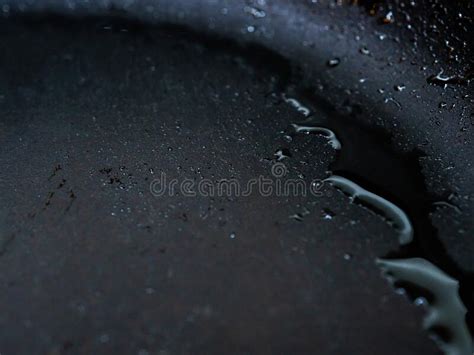 Selective Focus On Drops Of Hot Oil On The Surface Of The Pan Abstract
